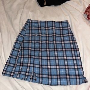 Brandy Melville blue plaid skirt. One size but fits xs to small :)